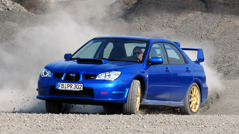 Illustration for article titled Subaru Impreza WRX and STI VS. Mitsubishi Lancer Evolution: Who Ya Got?